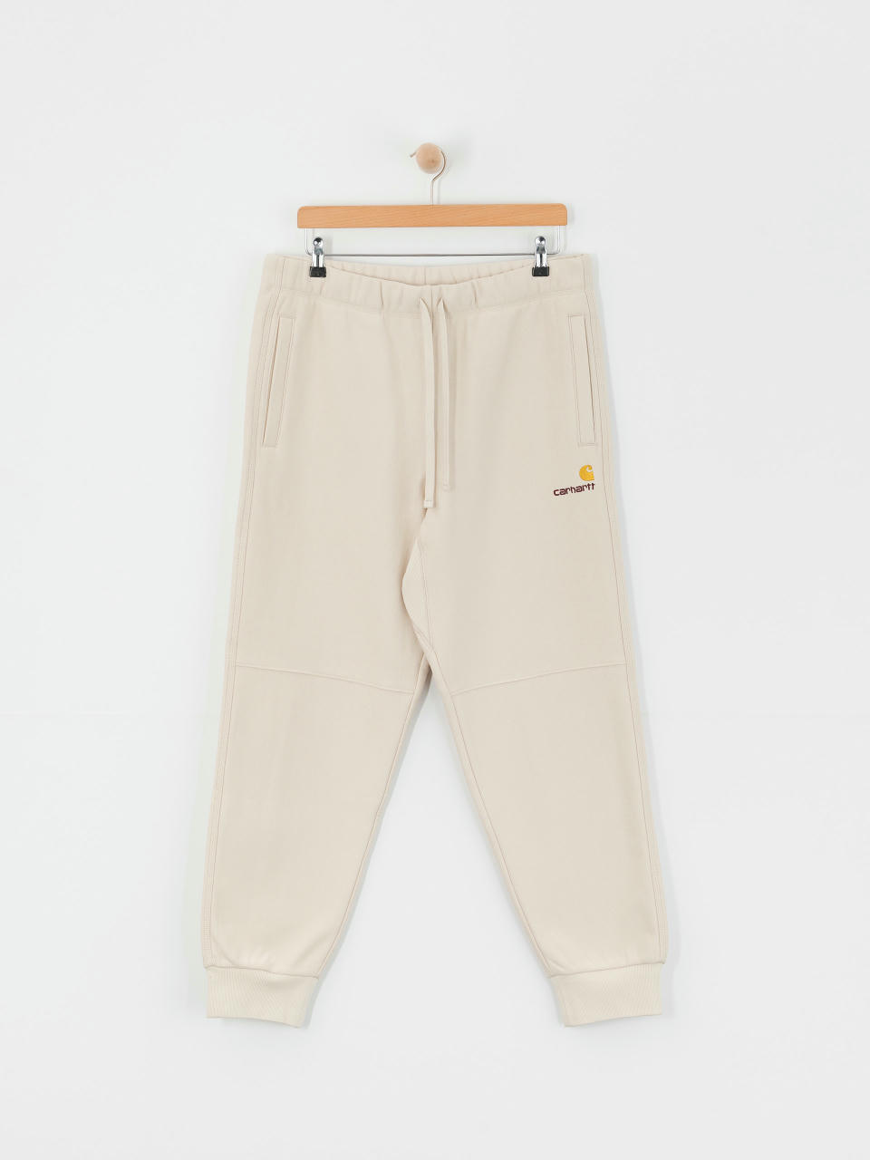 Панталони Carhartt WIP American Script Jogging (moonbeam)