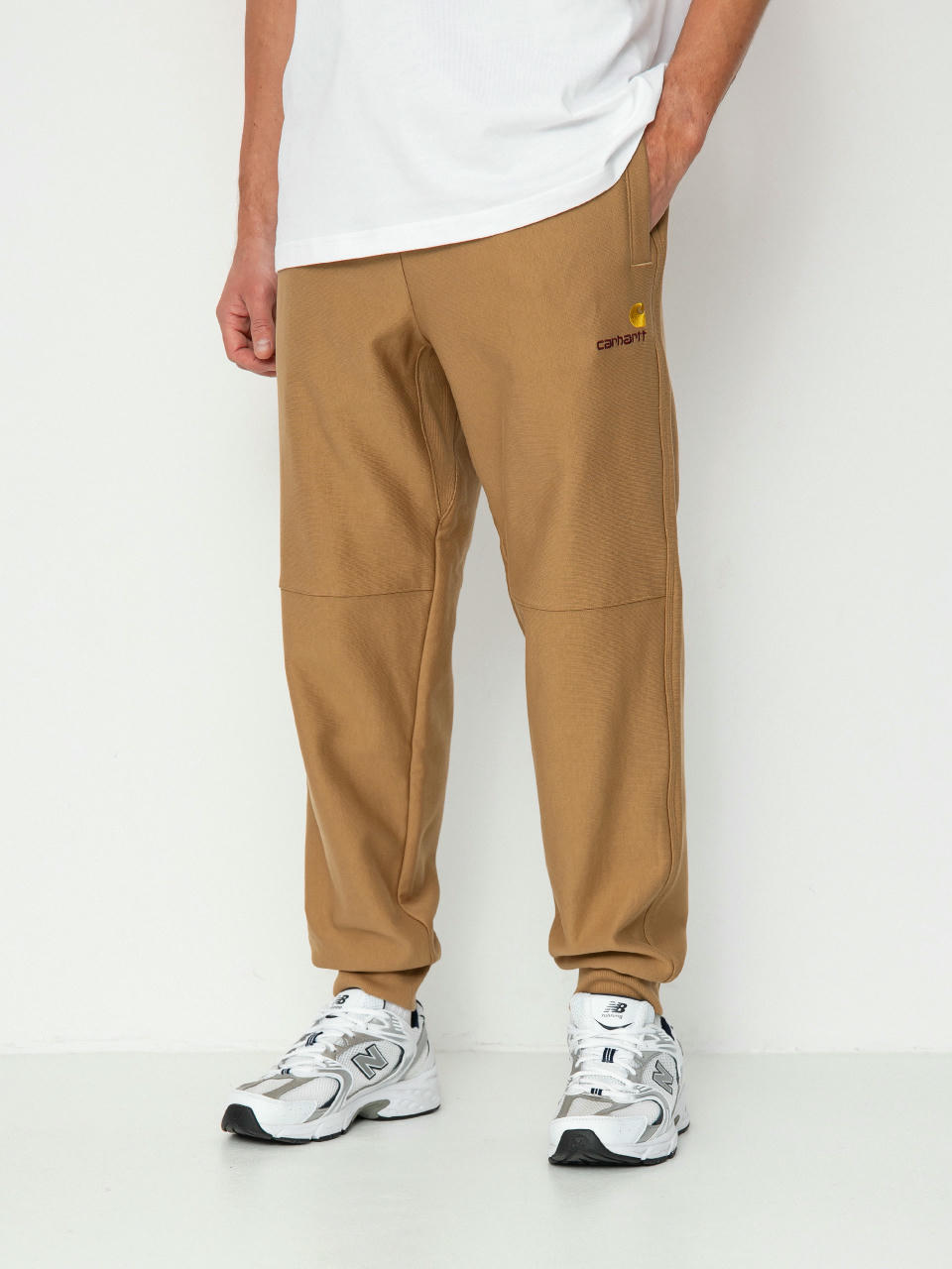 Панталони Carhartt WIP American Script Jogging (peanut)