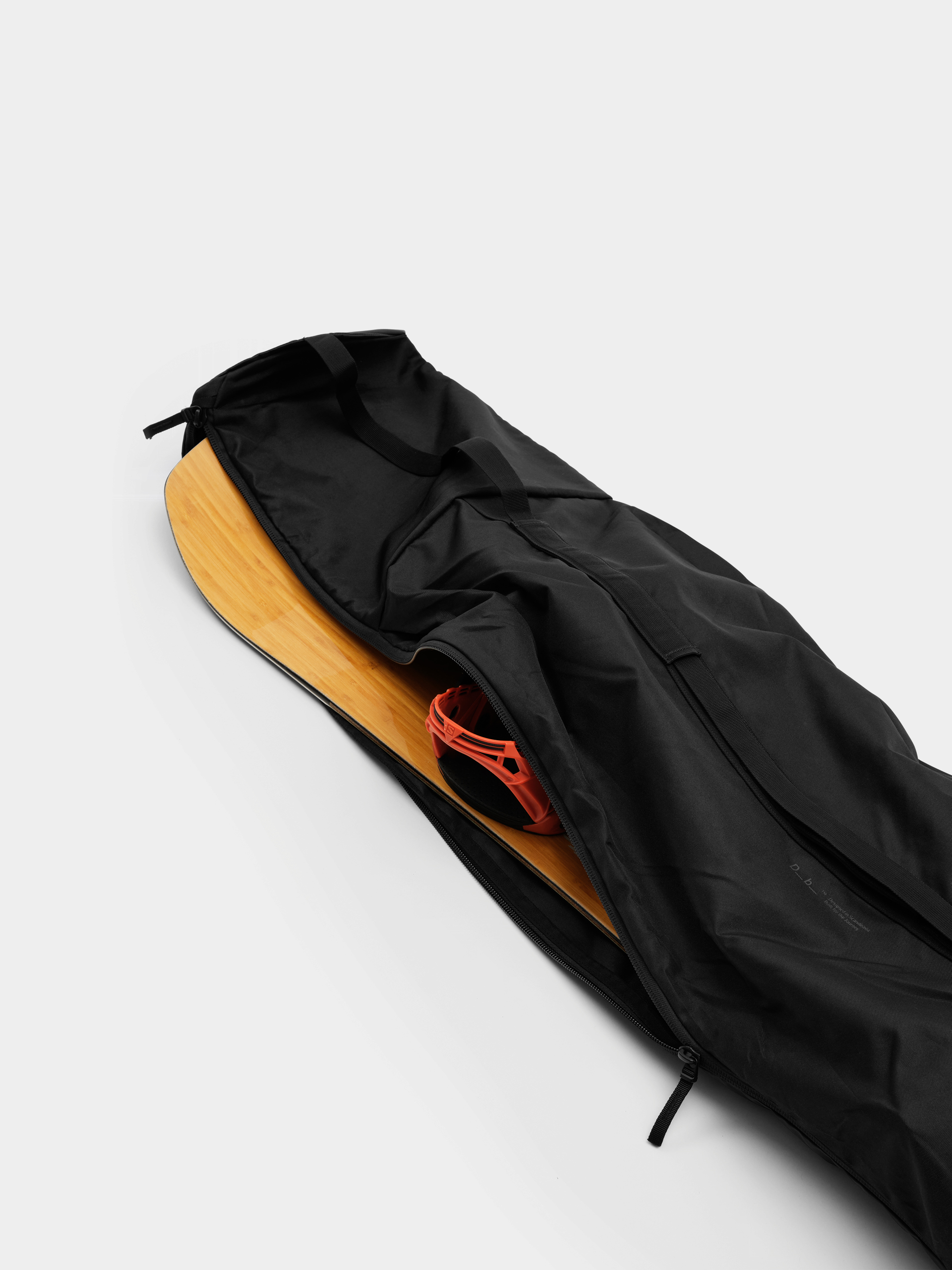 Ски калъф Db Snow Essential Snowboard Bag (black out)