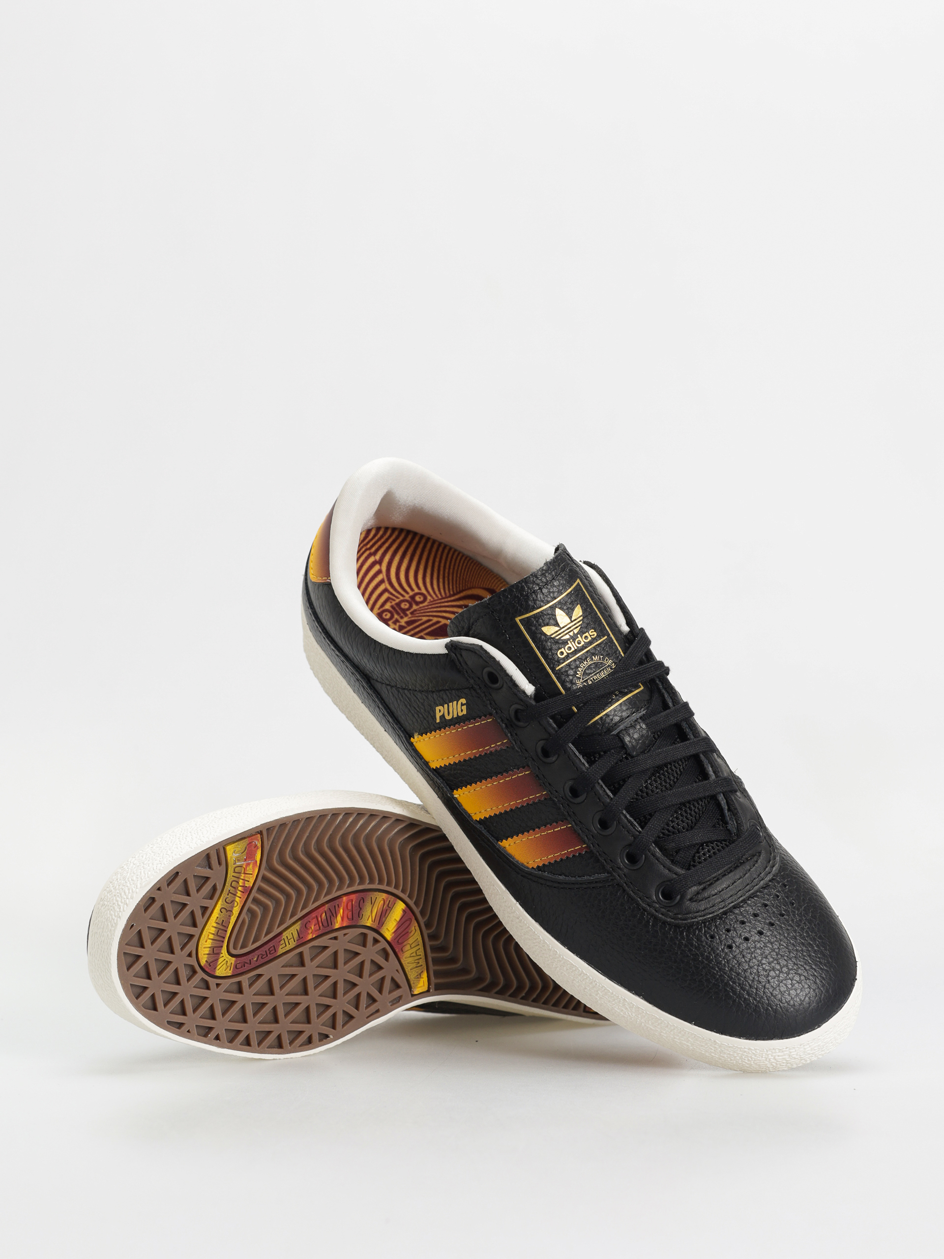Обувки adidas Puig Indoor (cblack/shared/creyel)