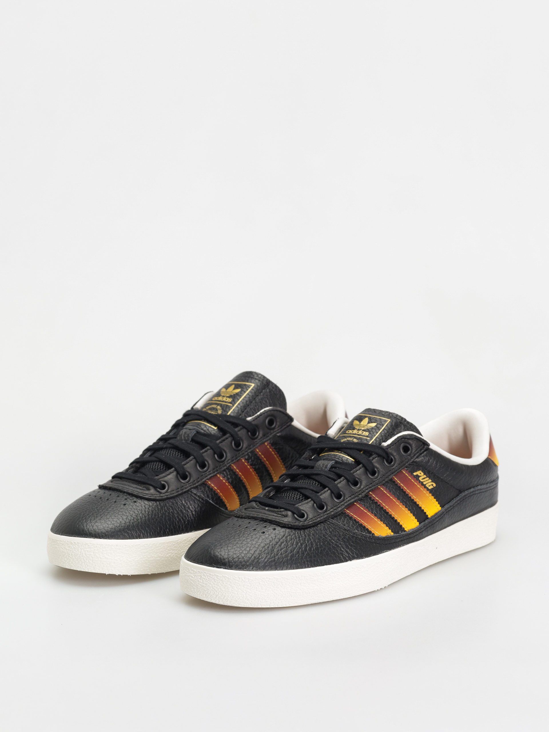Обувки adidas Puig Indoor (cblack/shared/creyel)