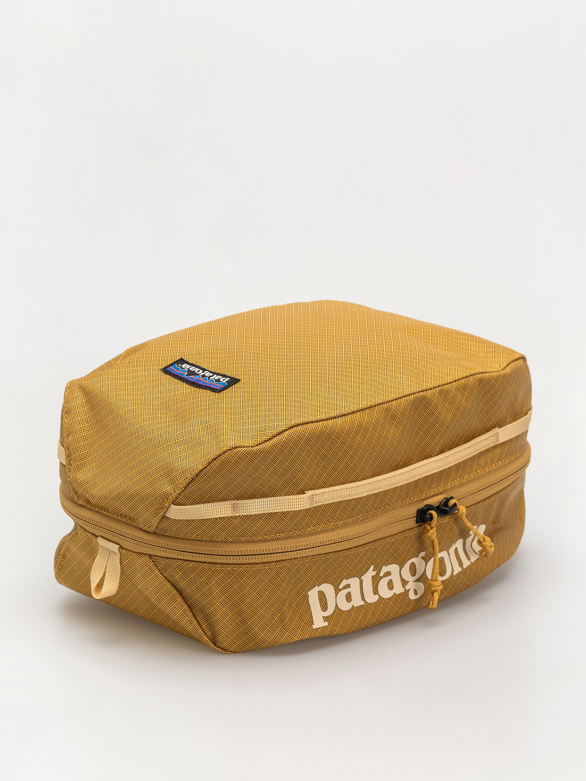 Козметична чантичка Patagonia Black Hole Cube 6L (pufferfish gold w/beeswax tan)