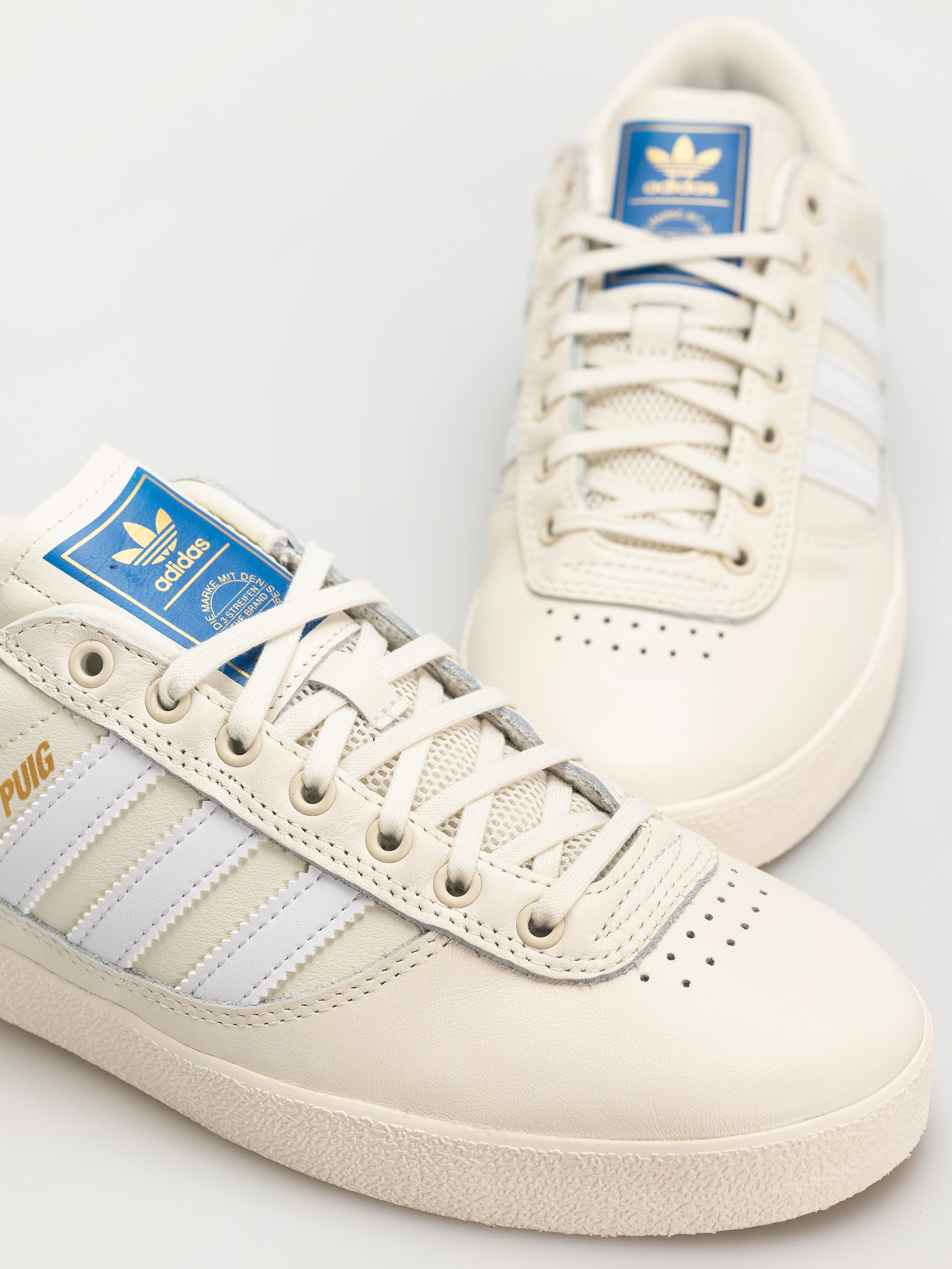 Обувки adidas Puig Indoor (owhite/ftwwht/blubir)