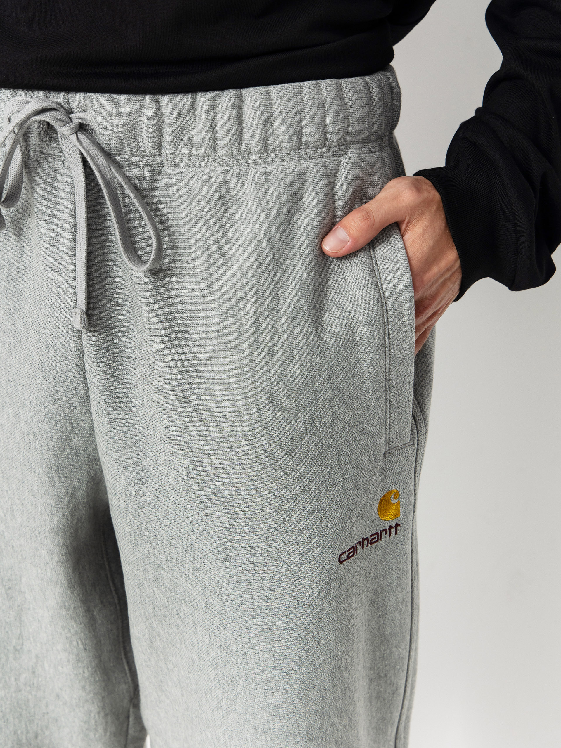 Панталони Carhartt WIP American Script Jogging (grey heather)