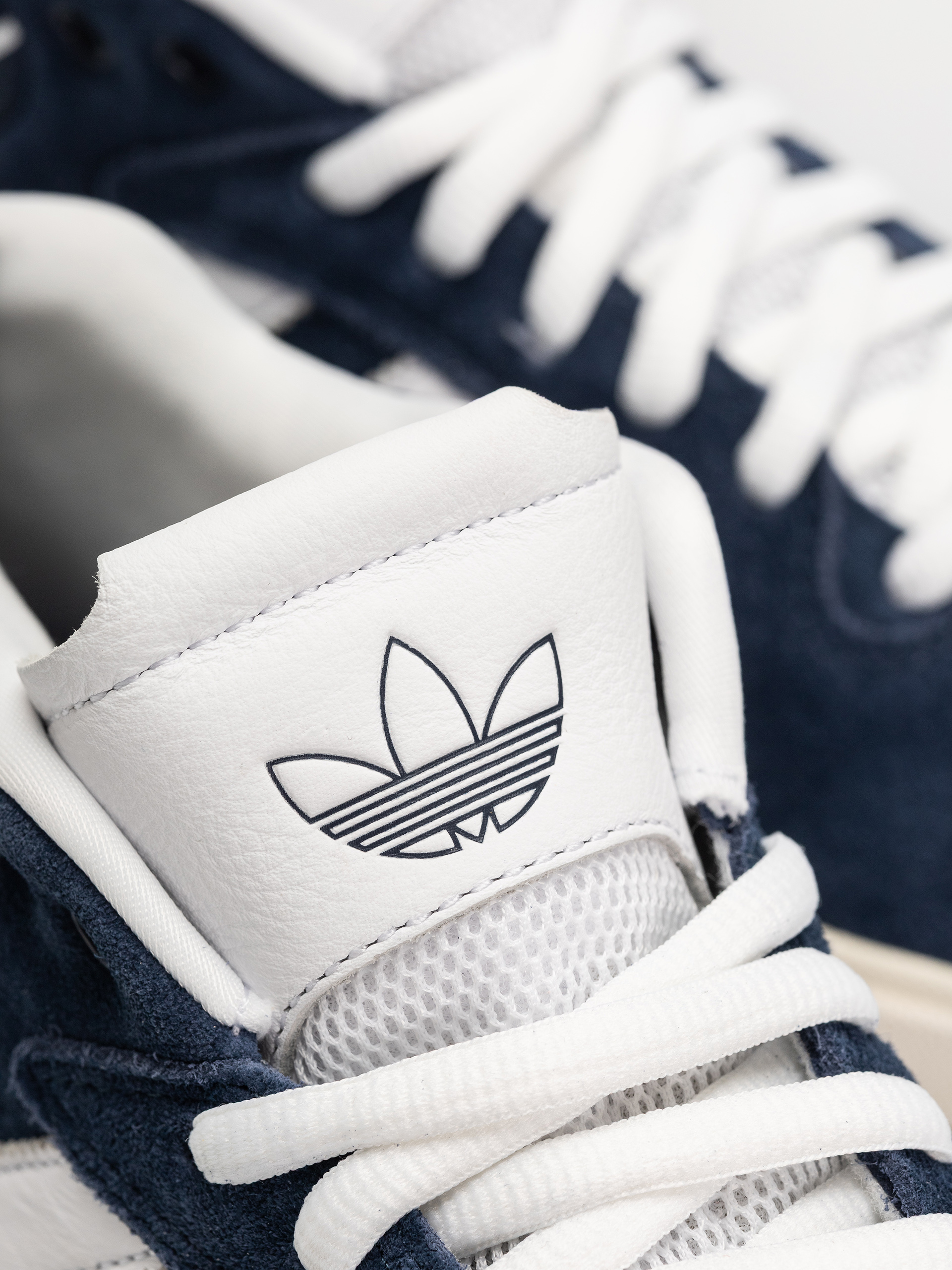 Обувки adidas Tyshawn (conavy/ftwwht/cwhite)