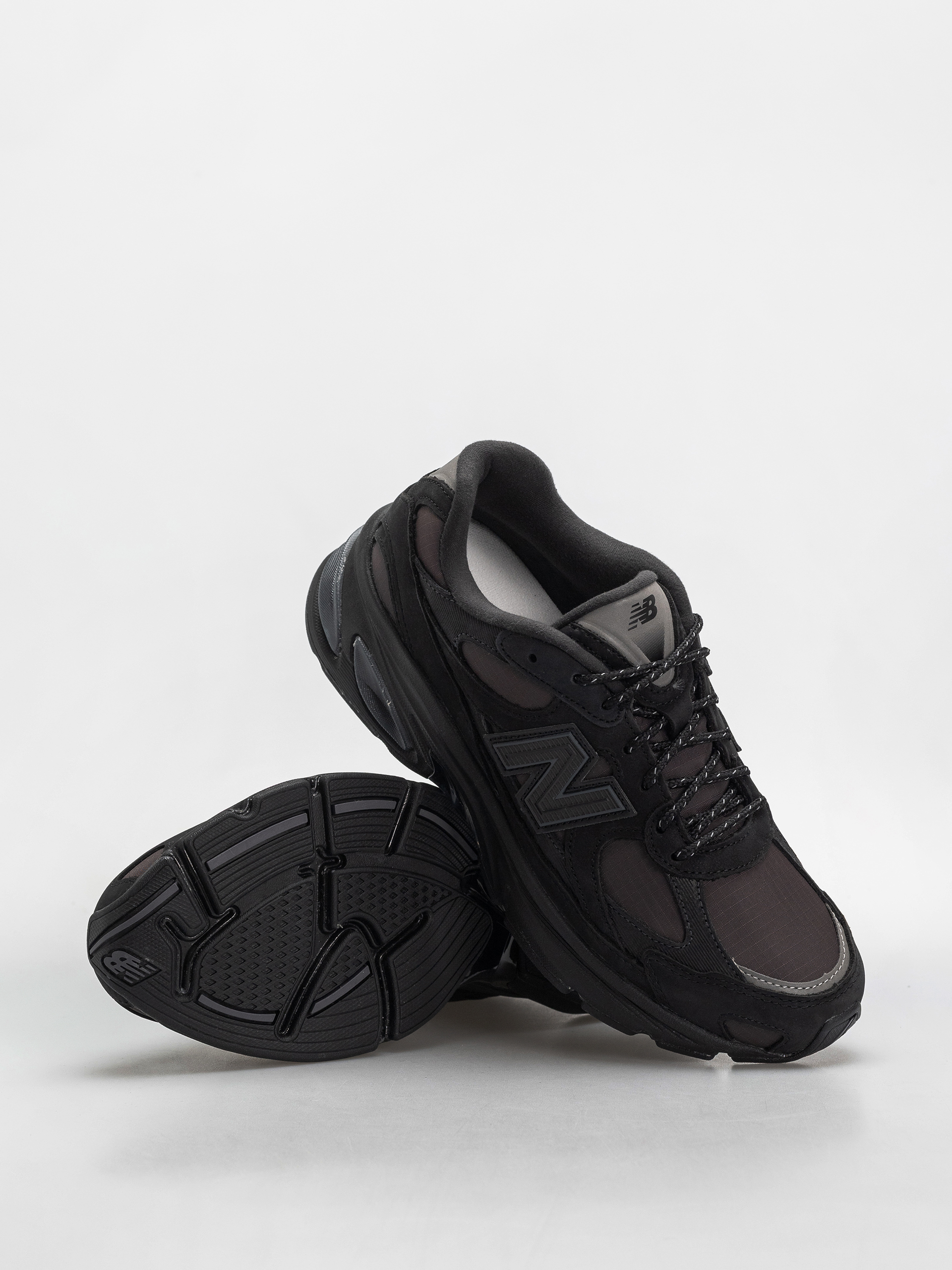 Обувки New Balance 2010 (black/faded black/phantom)