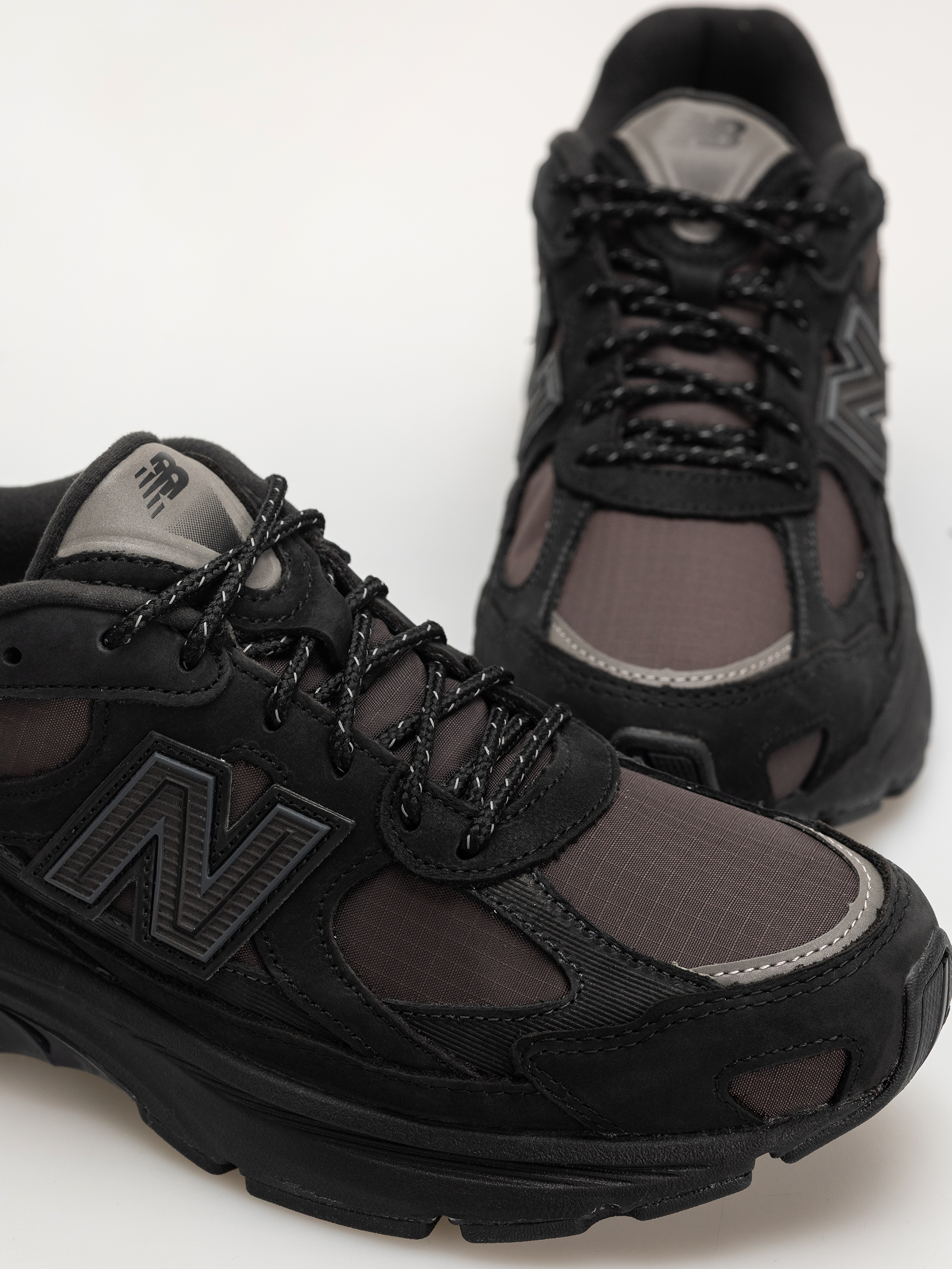 Обувки New Balance 2010 (black/faded black/phantom)