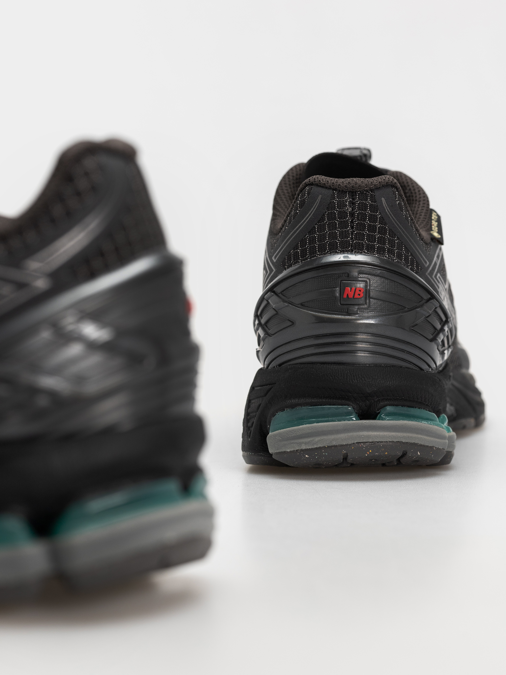 Обувки New Balance 1906 (castlerock/faded black)