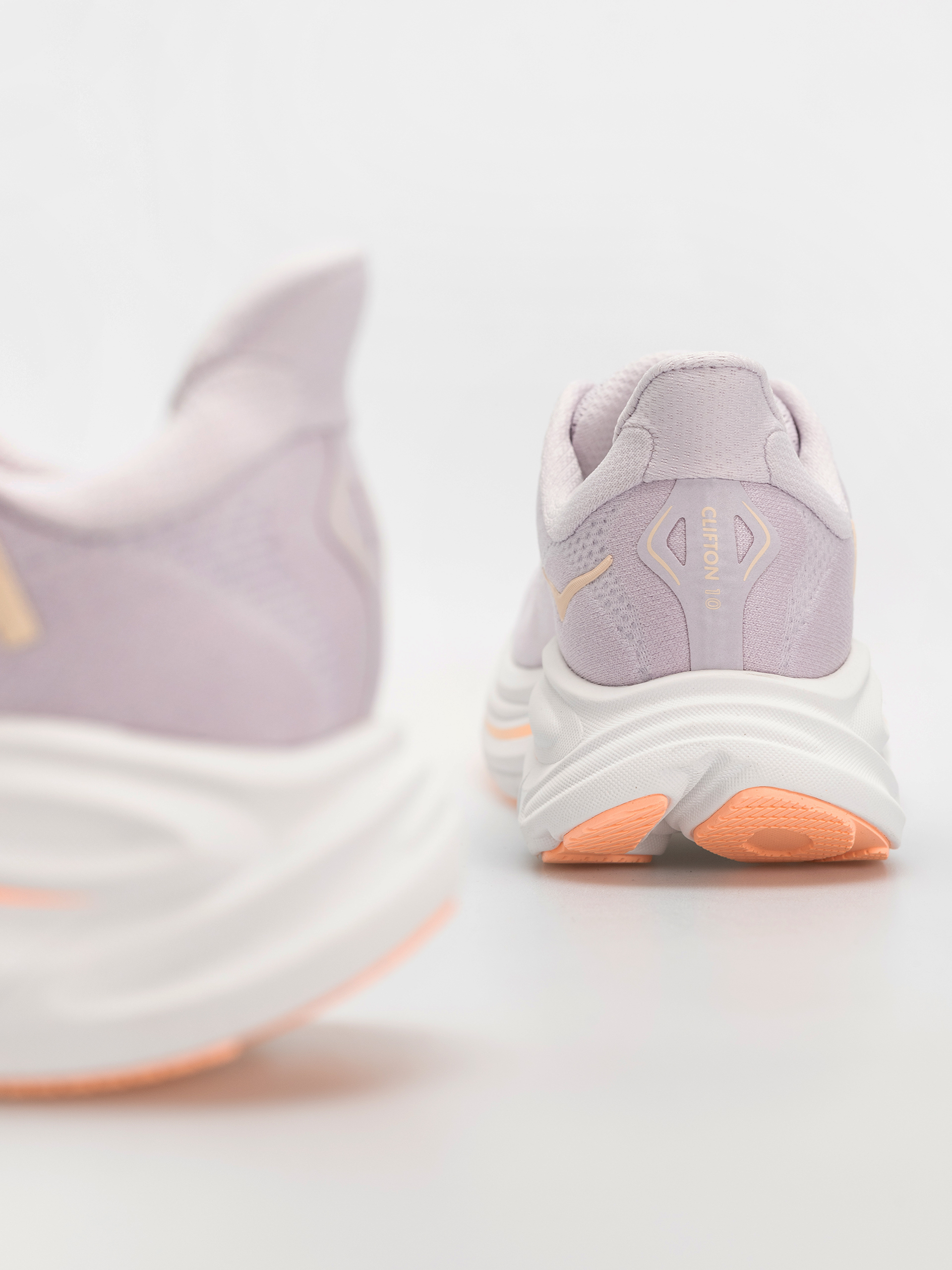 Обувки Hoka Clifton 10 Wmn (lilac cream/tangerine glow)