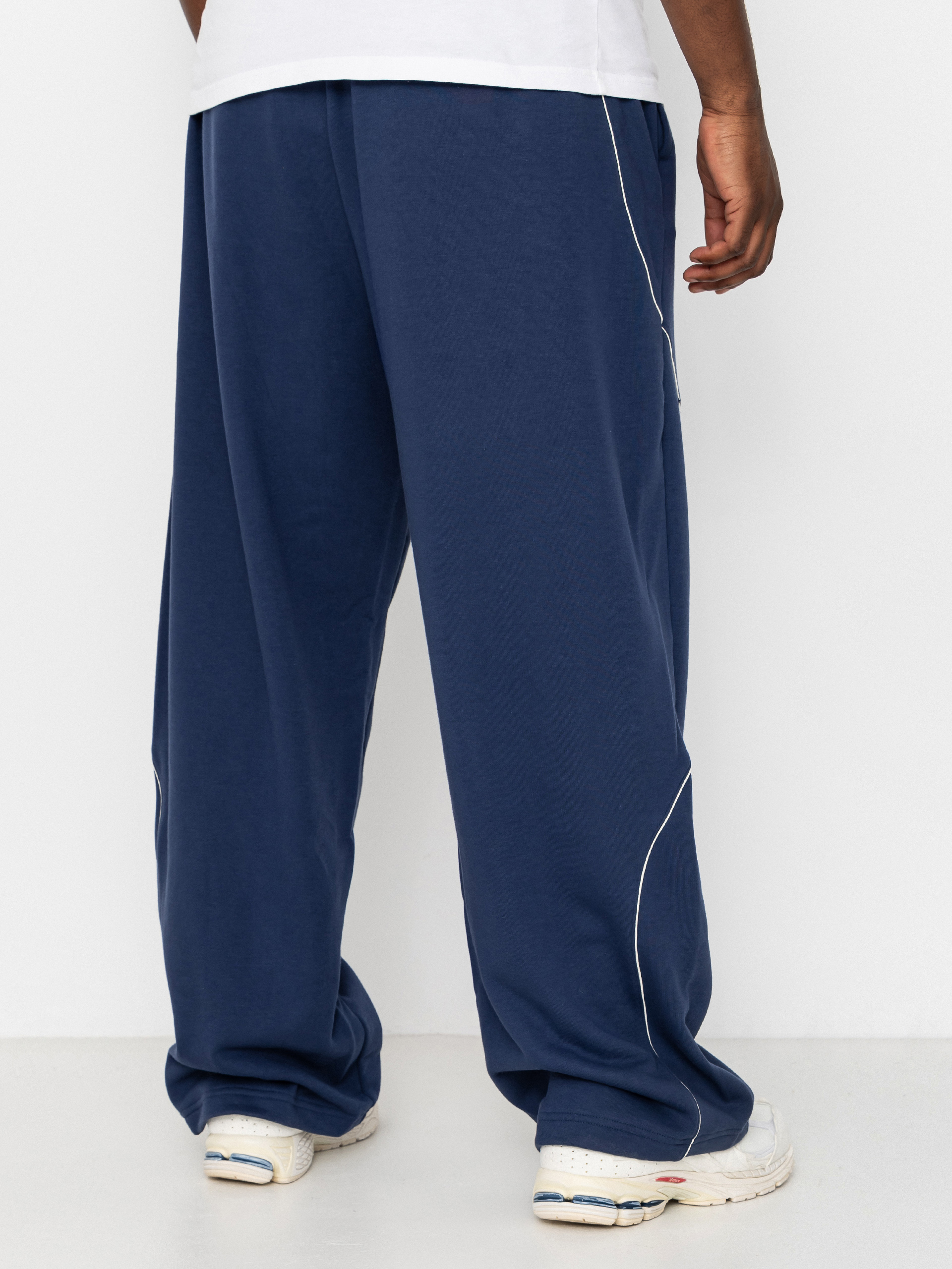 Панталони New Balance Trackside French Terry (navy)