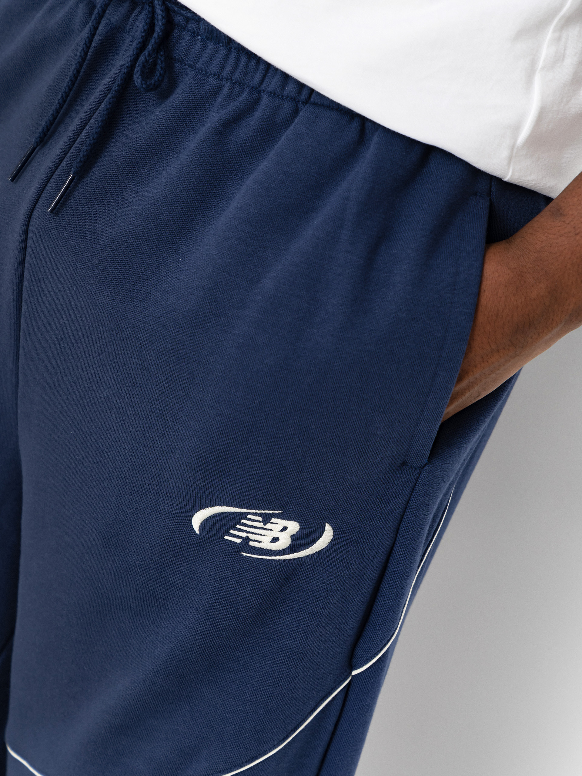 Панталони New Balance Trackside French Terry (navy)