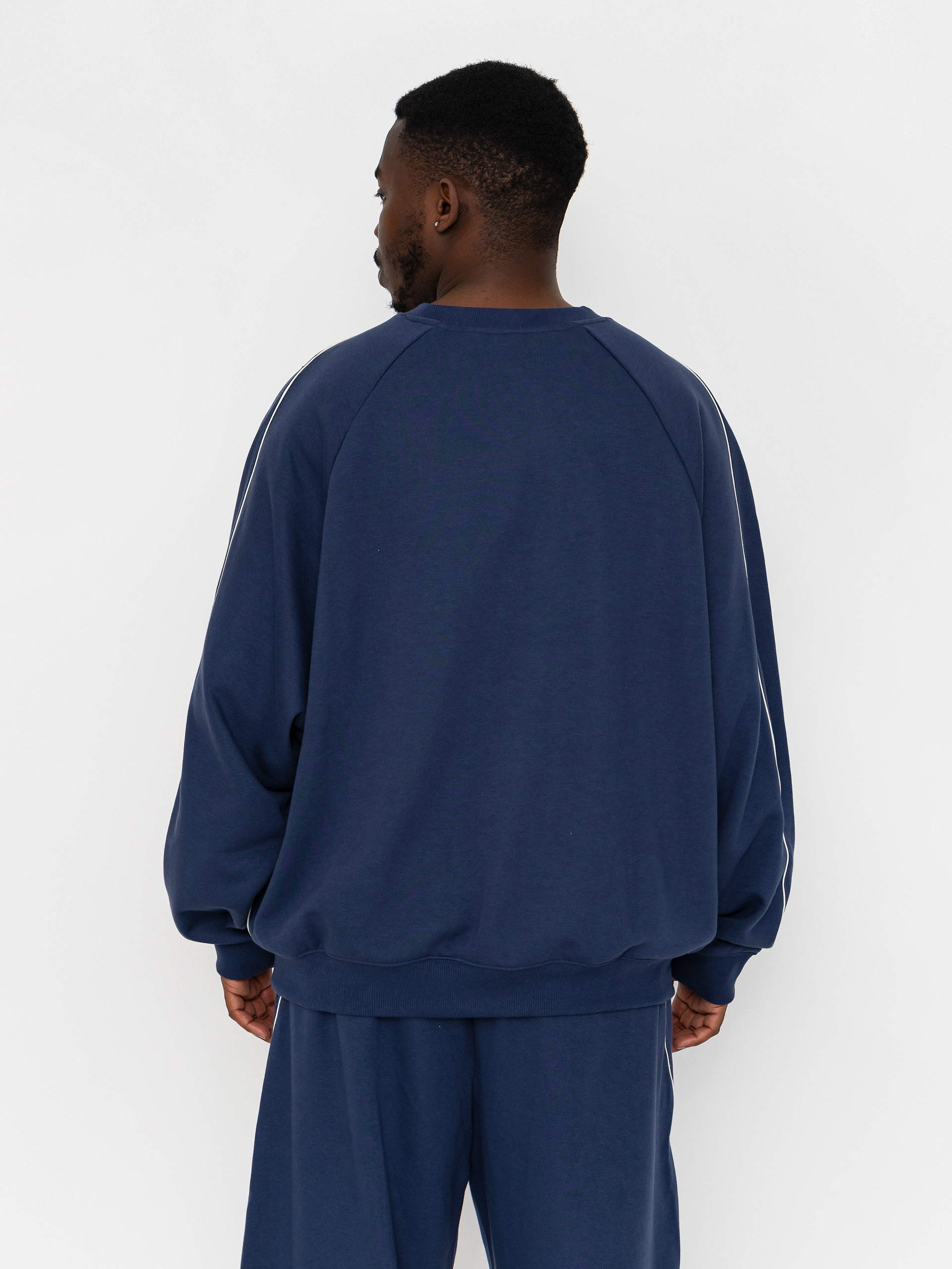 Суитшърт New Balance Trackside French Terry (navy)