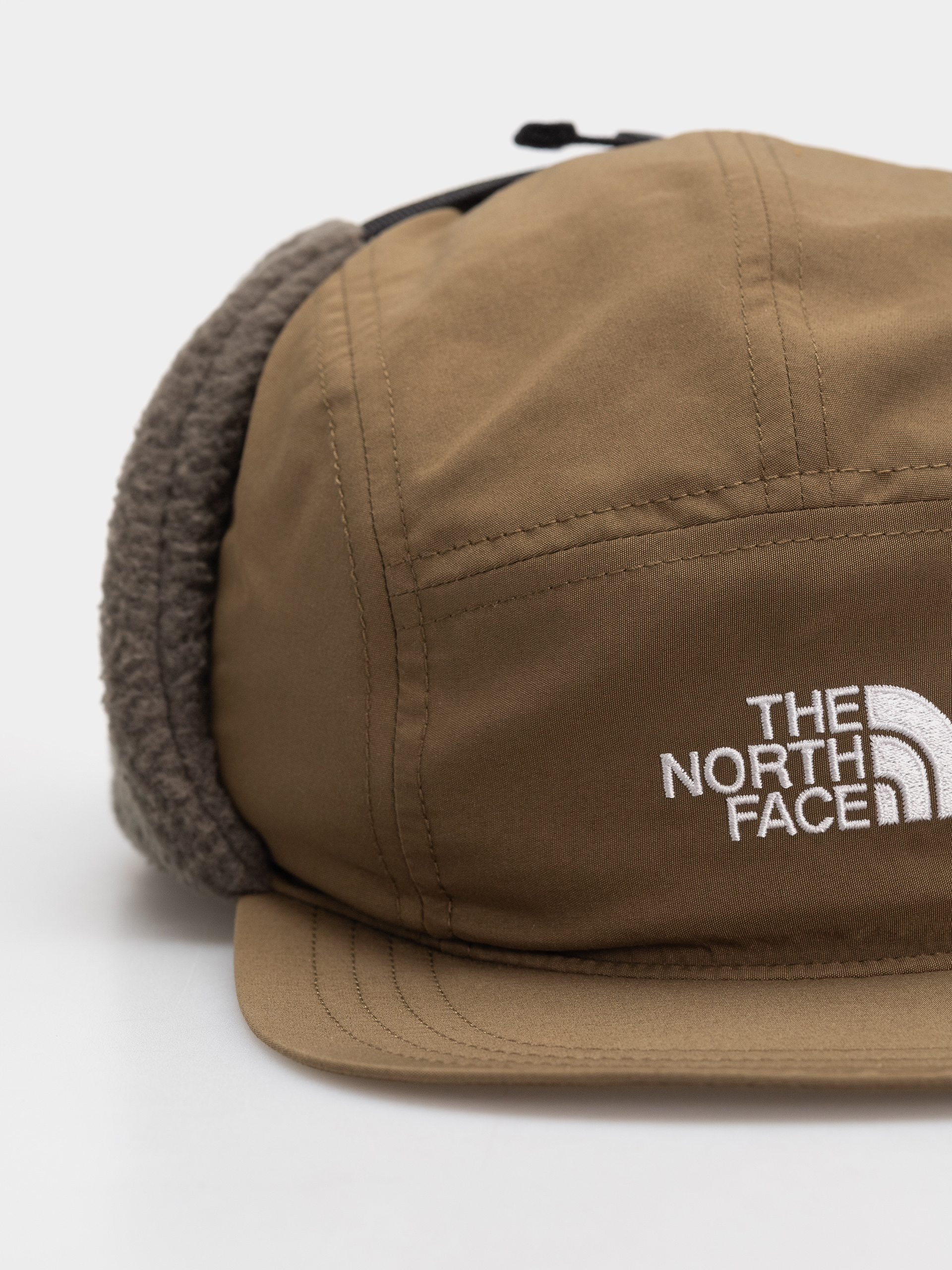 Шапка с козирка The North Face Yumiori Trapper (caraway seed/new taupe)